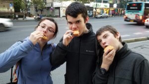 American teens eating Chinese cookies in Hangzhou