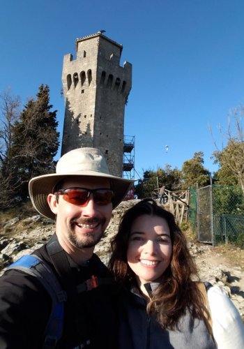 Jenny and Frank Morin pose in front of the Guaita Fortress in San Marino.